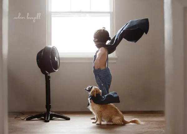 Una niña y su perro: la historia de una amistad feliz captada en 14 bellos retratos