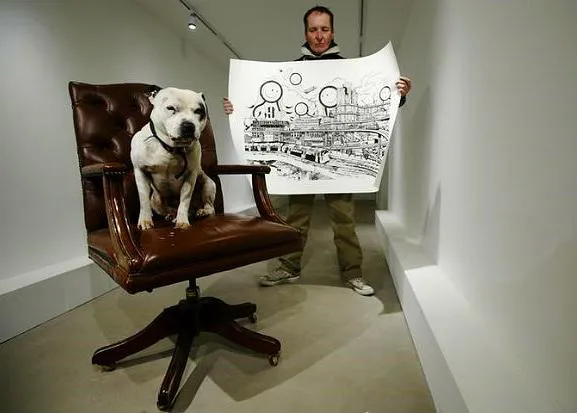 Perros que cambian vidas: John y George, su musa y tabla de salvación